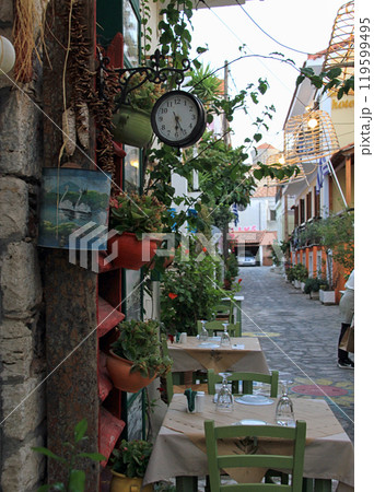 Pythagoreio, Samos, Greece - August 3 2024: traditional taverna on the old street  at Pythagoreio town, Samos Island 119599495