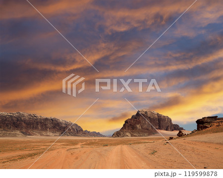 Wadi Rum Desert also known as The Valley of the Moon (against the sky with clouds)-- is a valley cut into the sandstone and granite rock in southern Jordan 60 km to the east of Aqaba Wadi Rum Desert also known as The Valley of the Moon (against the sky with clouds)-- is a valley cut into the sandstone and granite rock in southern Jordan 60 km to the east of Aqaba 119599878