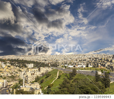 Amman city landmarks-- old roman Citadel Hill, Jordan. Against the background of a beautiful sky with clouds 119599943