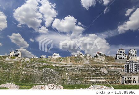 Amman city landmarks-- old roman Citadel Hill, Jordan. Against the background of a beautiful sky with clouds 119599966