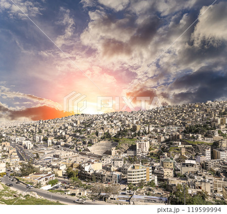 Amman city landmarks-- old roman Citadel Hill, Jordan. Against the background of a beautiful sky with clouds Amman city landmarks-- old roman Citadel Hill, Jordan. Against the background of a beautiful sky with clouds 119599994