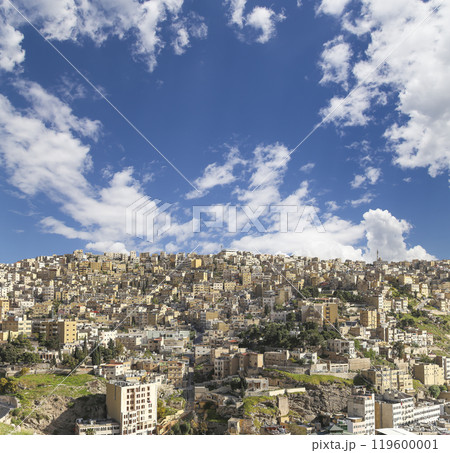 Amman city landmarks-- old roman Citadel Hill, Jordan. Against the background of a beautiful sky with clouds Amman city landmarks-- old roman Citadel Hill, Jordan. Against the background of a beautiful sky with clouds 119600001