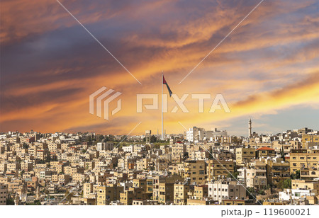 Amman city landmarks-- old roman Citadel Hill, Jordan. Against the background of a beautiful sky with clouds Amman city landmarks-- old roman Citadel Hill, Jordan. Against the background of a beautiful sky with clouds 119600021