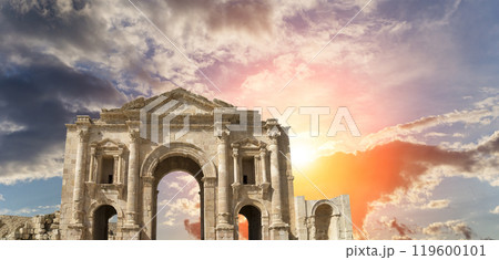 Arch of Hadrian in Gerasa (Jerash)-- was built to honor the visit of emperor Hadrian to Jerash in 129/130 AD, Jordan. Against the background of a beautiful sky with clouds 119600101