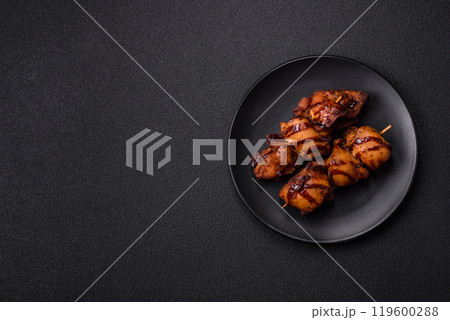 Grilled chicken or turkey shish kebab with salt, spices and herbs 119600288