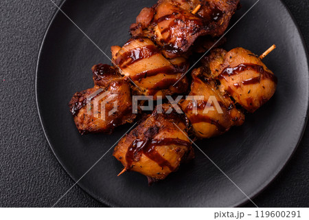 Grilled chicken or turkey shish kebab with salt, spices and herbs 119600291