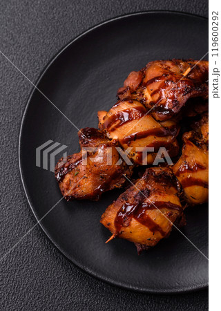 Grilled chicken or turkey shish kebab with salt, spices and herbs 119600292