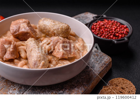 Cassoulet with white beans, meat and sausages, vegetables, salt and spices Cassoulet with white beans, meat and sausages, vegetables, salt and spices 119600412