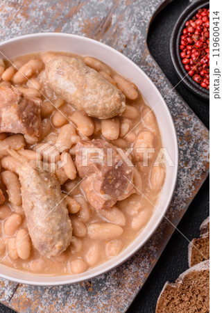 Cassoulet with white beans, meat and sausages, vegetables, salt and spices Cassoulet with white beans, meat and sausages, vegetables, salt and spices 119600414
