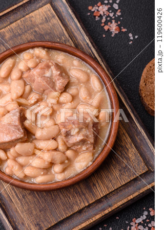 Cassoulet with white beans, meat and sausages, vegetables, salt and spices 119600426