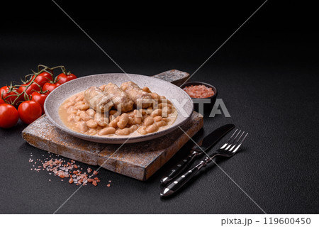 Cassoulet with white beans, meat and sausages, vegetables, salt and spices Cassoulet with white beans, meat and sausages, vegetables, salt and spices 119600450