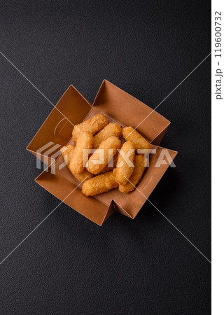 Fast food breaded cheese sticks with salt and spices Fast food breaded cheese sticks with salt and spices 119600732