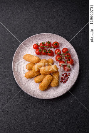 Fast food breaded cheese sticks with salt and spices 119600755