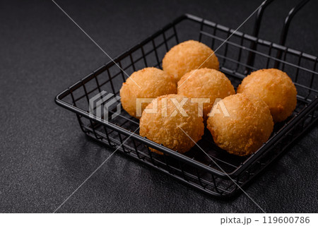 Fast food cheese balls breaded with salt and spices Fast food cheese balls breaded with salt and spices 119600786