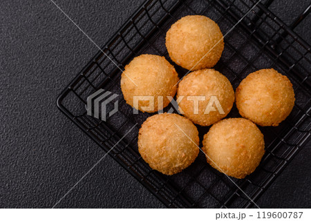 Fast food cheese balls breaded with salt and spices Fast food cheese balls breaded with salt and spices 119600787
