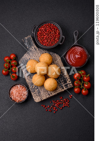 Fast food cheese balls breaded with salt and spices 119600808