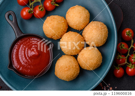 Fast food cheese balls breaded with salt and spices 119600816