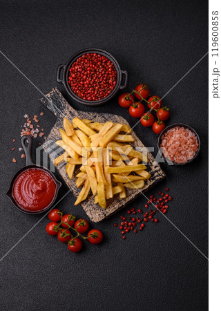 Fast food french fries with salt and spices 119600858
