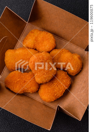 Fast food chicken nuggets breaded with salt and spices Fast food chicken nuggets breaded with salt and spices 119600875