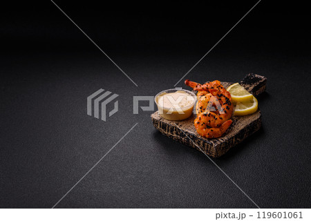 Boiled tiger prawns with white sauce and lemon Boiled tiger prawns with white sauce and lemon 119601061