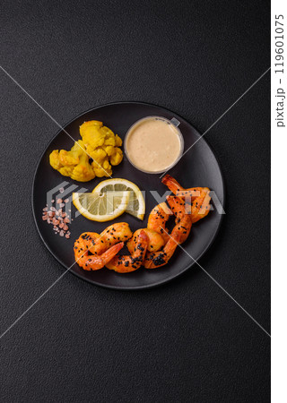 Boiled tiger prawns with white sauce and lemon Boiled tiger prawns with white sauce and lemon 119601075