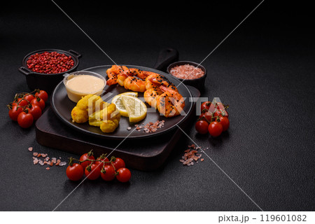 Boiled tiger prawns with white sauce and lemon Boiled tiger prawns with white sauce and lemon 119601082