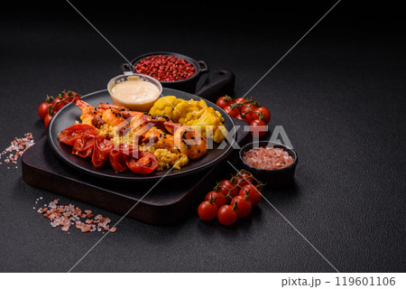 Boiled tiger shrimps with porridge, tomatoes and corn 119601106