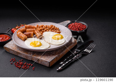 Full English breakfast with boiled eggs, beans, sausages, tomatoes 119601190
