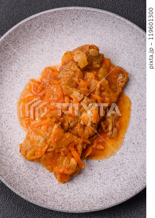 Sliced fish in tomato sauce with salt and spices Sliced fish in tomato sauce with salt and spices 119601300