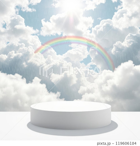 Cloud podium bathed in sunlight after rain, with a vibrant rainbow stretching across the sky. 119606184