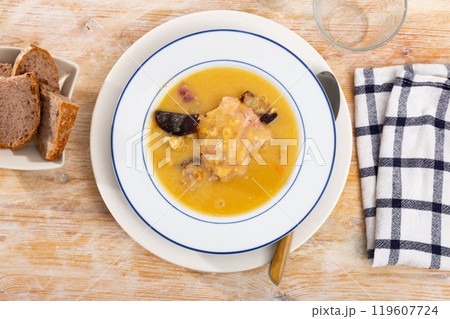 delicious pea soup with smoked meats delicious pea soup with smoked meats 119607724