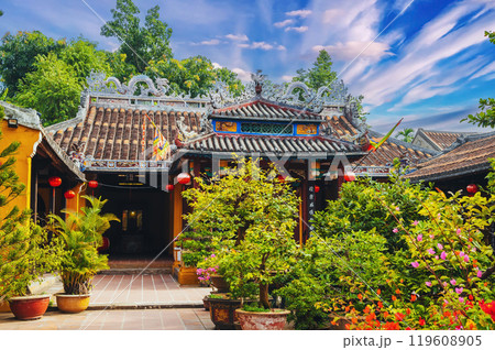 Asian Buddhist temple on Vietnamese pagoda in the old town in Hoi An in Vietnam in Asia at sunset in summer Asian Buddhist temple on Vietnamese pagoda in the old town in Hoi An in Vietnam in Asia at sunset in summer 119608905