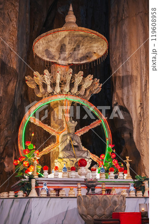 Buddhist Buddha statue and altar inside Asian temple in the Am Phu Cave in Marble Mountains in Da Nang in Vietnam Buddhist Buddha statue and altar inside Asian temple in the Am Phu Cave in Marble Mountains in Da Nang in Vietnam 119608958