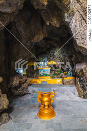 Buddhist temple with statues and sanctuary inside Lynch Nham Cave in Marble Mountains in Da Nang in Vietnam in Asia Buddhist temple with statues and sanctuary inside Lynch Nham Cave in Marble Mountains in Da Nang in Vietnam in Asia 119608975