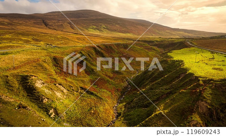 Beautiful Ireland - Enjoy the breathtaking view of a stunning coastal landscape with rocky cliffs 119609243