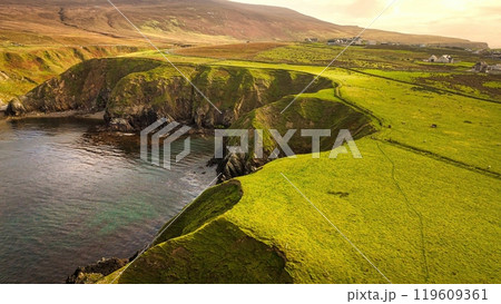 A Beautiful Coastal Landscape Featuring Rocks and Glimmering Water, Capturing Natures Splendor 119609361