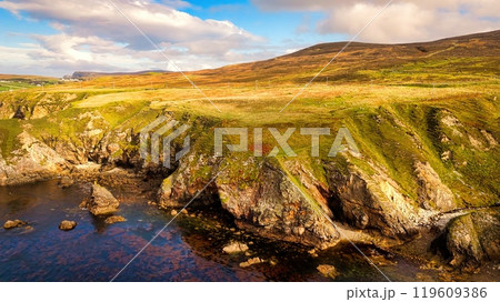 Beautiful Ireland - Enjoy the breathtaking view of a stunning coastal landscape with rocky cliffs 119609386