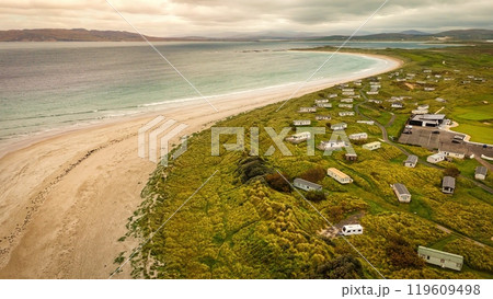 A Beautiful Coastal Landscape Featuring Rocks and Glimmering Water, Capturing Natures Splendor 119609498
