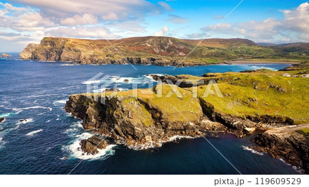 A Beautiful Coastal Landscape Featuring Rocks and Glimmering Water, Capturing Natures Splendor 119609529