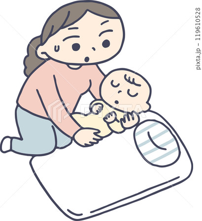 眠った赤ちゃんをゆっくり布団に寝かせるお母さん 119610528