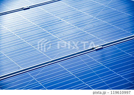 closeup photovoltaic panels which installed on the rooftop of the building, concept for storing and using natural power from the sunlight to care about human environment over the world. closeup photovoltaic panels which installed on the rooftop of the building, concept for storing and using natural power from the sunlight to care about human environment over the world. 119610997