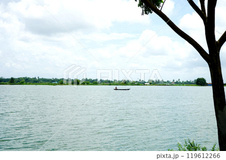 Fishing in Kharibari Wetland with fishing boat Fishing in Kharibari Wetland with fishing boat 119612266