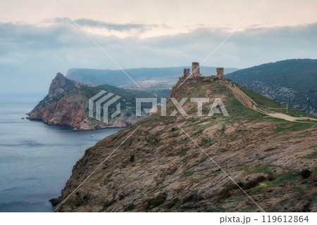 Sea landscape with rocks and tower. Sea landscape with rocks and tower. 119612864