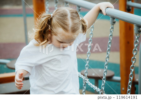 A Playful Child Happily Enjoying Various Outdoor 119614191