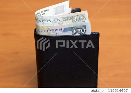 Cypriot pound in the black wallet Cypriot pound in the black wallet 119614497