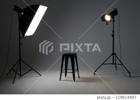Photo studio with lighting equipment. light scheme and chair. The concept of selection and casting. Job recruitment advertisement. 119614997