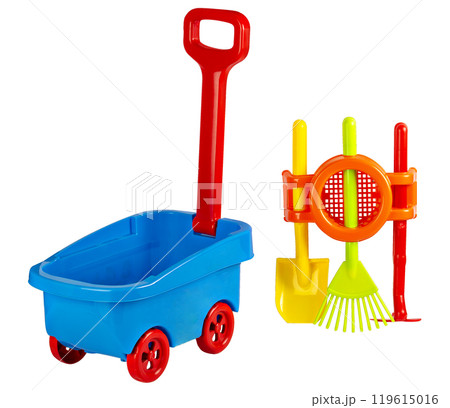 A set of children's toys for playing in the sand with a children's shovel, a car and a rake. the concept of children's recreation in the sandbox or on the beach. isolated on white background A set of children's toys for playing in the sand with a children's shovel, a car and a rake. the concept of children's recreation in the sandbox or on the beach. isolated on white background 119615016