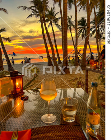 Colorful sunset on Boracay Island observed from a beach restaurant. High quality photo 119618435