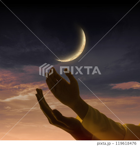 Religious Muslim praying while raised hands with crescent moon background 119618476