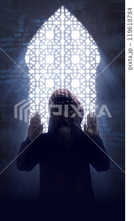 Religious old Muslim man praying (salat) in the mosque Religious old Muslim man praying (salat) in the mosque 119618784